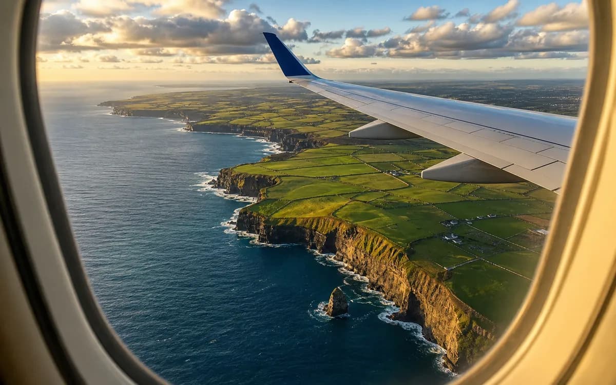 Aircraft wing over the Irish Atlantic coast